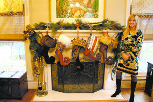 Laurel Patrick with her luxury stockings showcased on the mantle of her Cahaba Heights home.