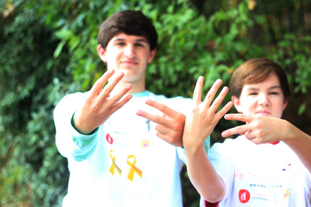 "More than four." Brett Lewis and childhood cancer survivor Sean Fridella are working with many other students at Mountain Brook Junior High to coordinate a Halloween fundraising campaign. Journal photo by Kaitlin Candelaria