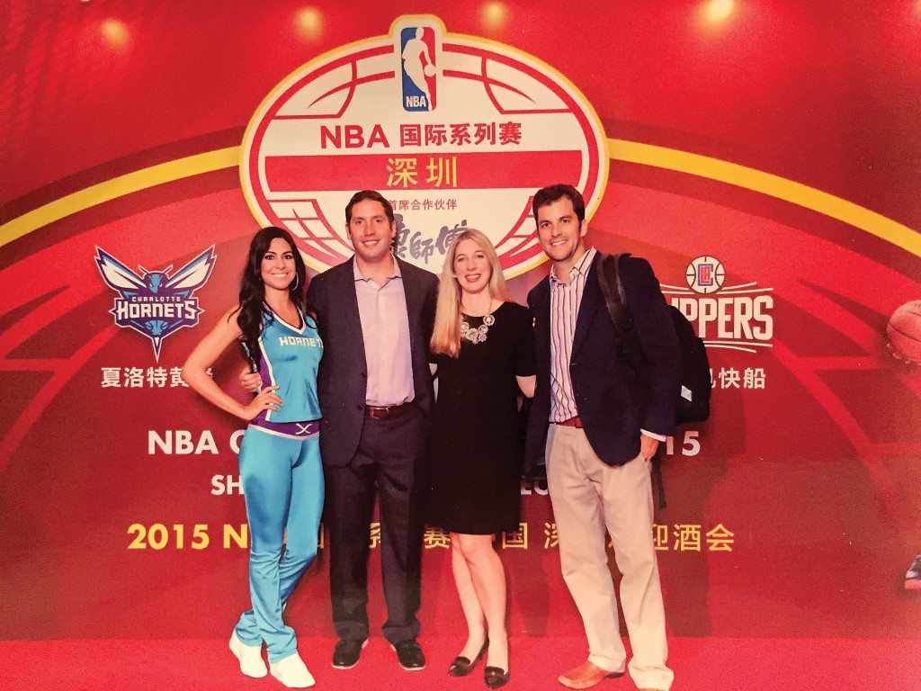 From left: A Hornet Honeybee, Dr. Stephen Gould, Dr. Sara Gould and Dr. David Gregorius are a just a few of the many people who traveled with the Charlotte Hornets and the LA Clippers for two global exhibition games. Photo special to the Journal