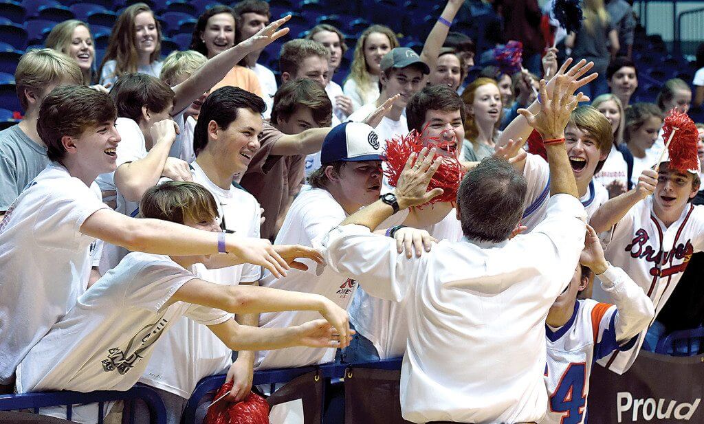 Homewood coach Tim Shepler celebrates with fans after the victory over J.O. Johnson in the Steel City Invitational championship game at the Pete Hanna Center in Homewood, Ala., Tuesday, Dec. 22, 2015. (OTMJ Photo/ Mark Almond)