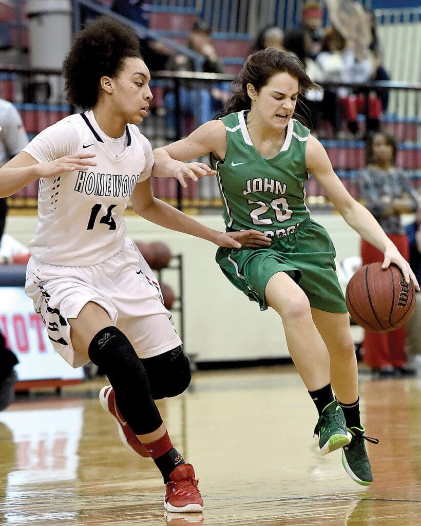 John Carroll's Kaitlin Gagliano works against the pressure of Homewood's Ajah Wayne during the Area 9 tournament championship game at Homewood High School in Homewood, Ala., Wednesday, Feb. 10, 2016. (Mark Almond/OTMJ Photo)