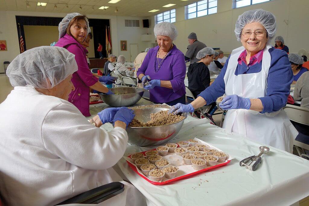 At St. Elias Maronite Catholic Church in downtown Birmingham, volunteers have to cook enough food to feed the thousands who attend its annual Lebanese Food and Culture Festival. Journal photo by Sarah Kuper.