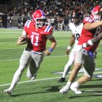 Charlie-Taaffe-runs-toward-the-edge-in-the-second-quarter-of-Vestavia-Hills-39-30-win-over-Hoover