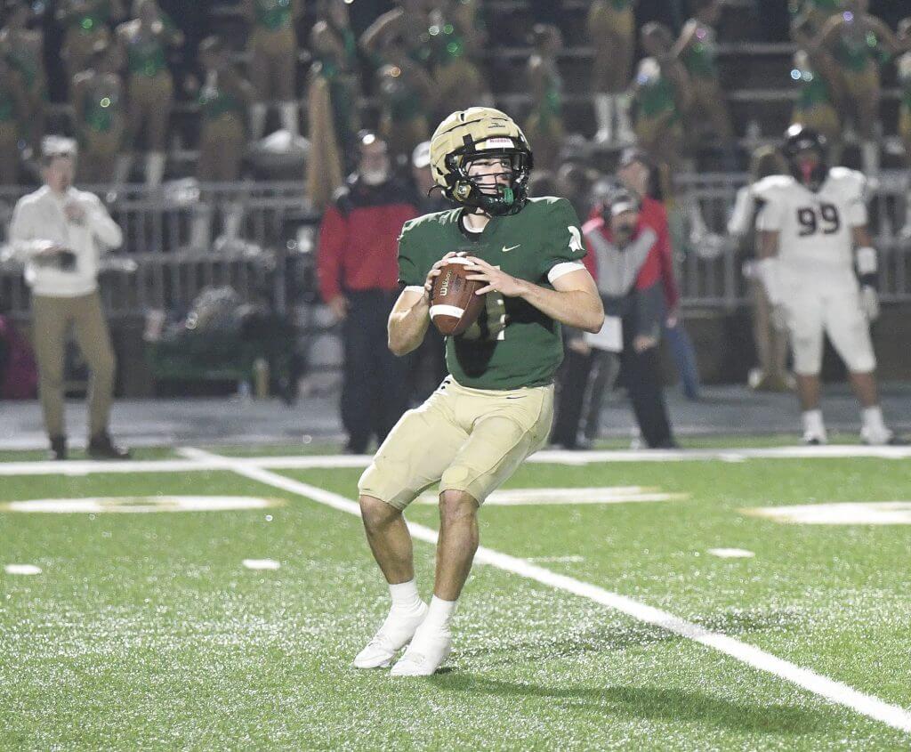 Mountain Brook quarterback Cayden Hofbauer sets up for a pass.