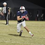 Homewood running back Reid Goldstein runs after catching a pass from Kaleb Carson during the Patriots' 38-14 playoff win over Pell City, Friday, November 8.