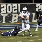 Homewood Tight End JT Watts runs through a Clay-Chalkville defender during the Patriots' playoff loss Friday, November 21.