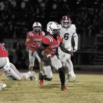 Kaleb Carson (#3) ran for three touchdowns and passed for one more during the Patriots' 31-24 playoff win over Hartselle, Friday, November 14.