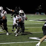Homewood quarterback Timothy Roshell runs the ball during the Patriots' road win over Pelham, 42-7