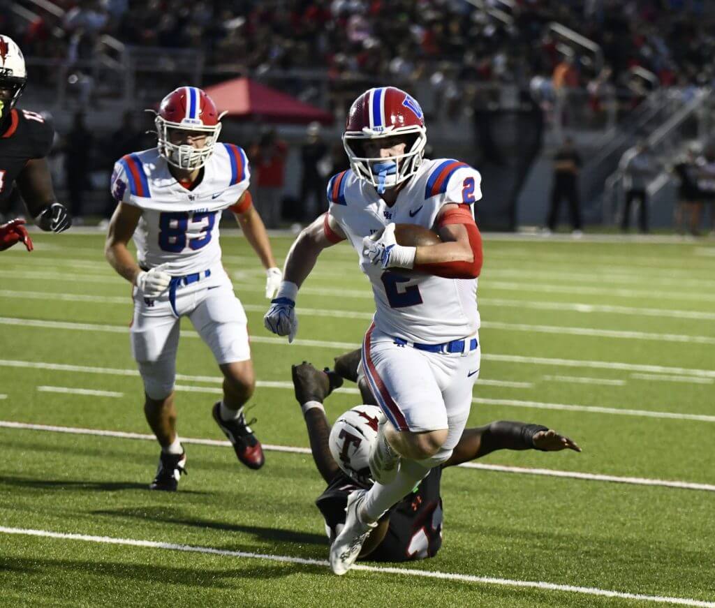 Vestavia Hills running back Noah Boylan carries the ball during the Rebels 49-0 loss to Thompson, Friday, September 4, in Alabaster.