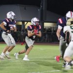 Reid Goldstein runs the ball against during Homewood's 33-13 victory over Mountain Brook, Friday, September 4, 2026.